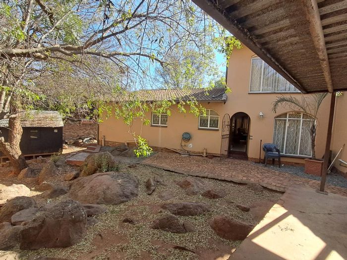 For Sale: Glenvista Family Home with Pool, Lapa, and Rock Garden Retreat