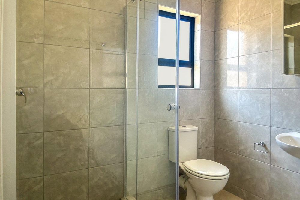 Family bathroom with shower.