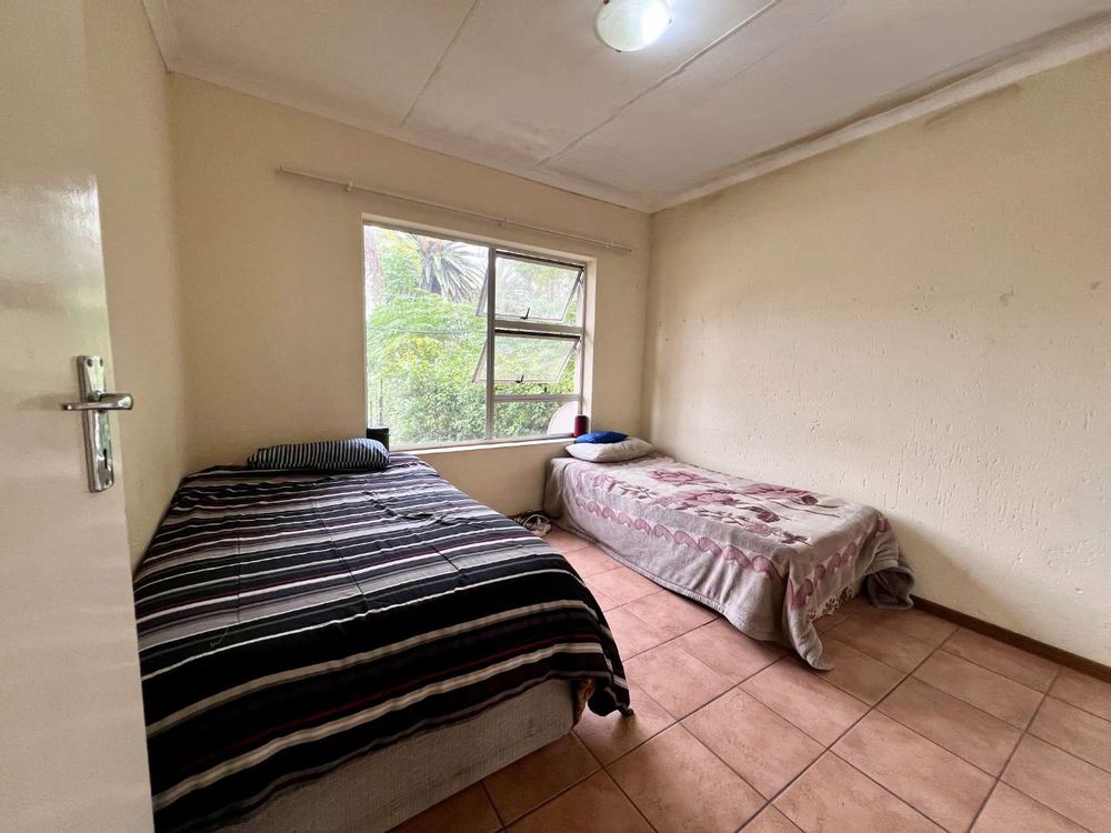 Sunny private main bedroom with extra large room 