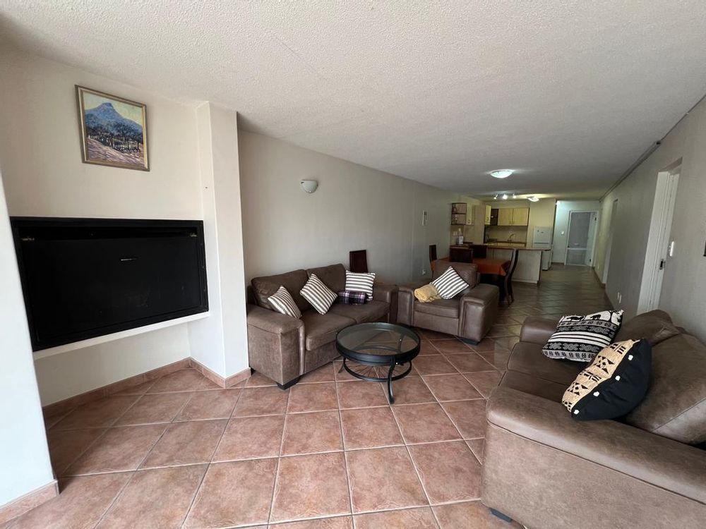 Open plan Kitchen/dining/lounge area with indoor BBQ