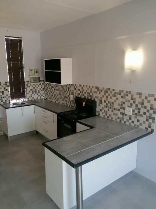 For Sale: Apartment in Pioniers Park with 2 bedrooms, balcony, and shaded parking.