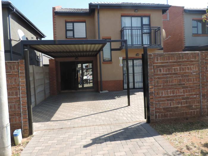 For Sale: House in Alrode South with secure estate, schools, and carport.