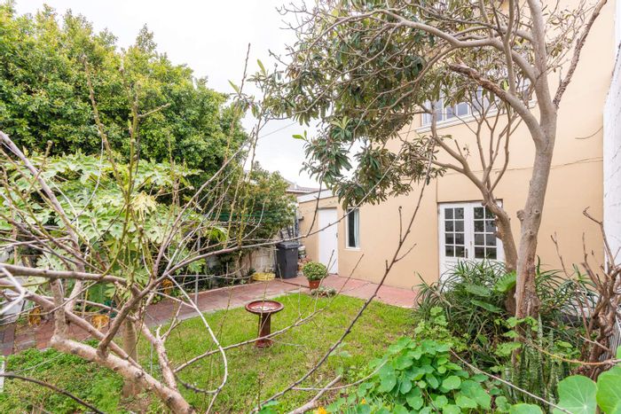 For Sale: Family-friendly 4-bedroom house in Woodstock, near Biscuit Mill amenities.