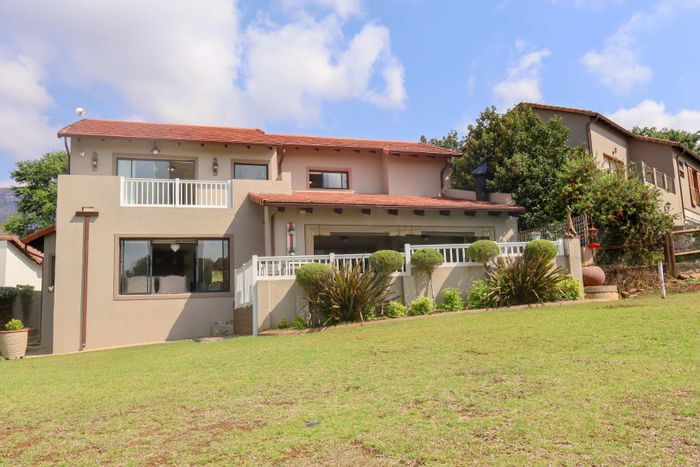 House For Sale in Hartbeespoort Central: Golf course views, heated pool, and guest suite.