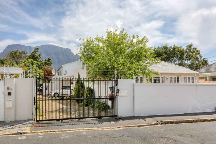 Claremont House For Sale: Gated community, solar power, spacious living, secure parking.