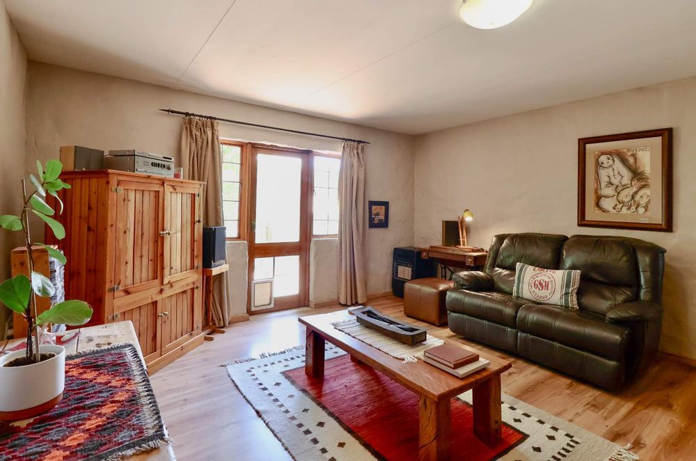TV room with door to patio