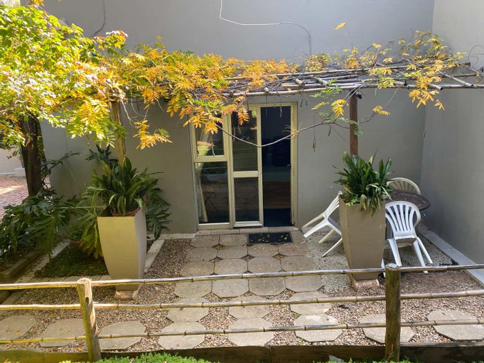 1-Bedroom Apartment To Rent in Craighall Park with garden, WiFi, and amenities nearby.