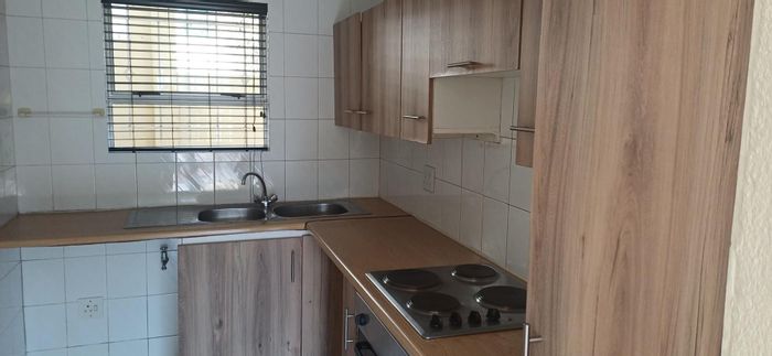 2-Bedroom Apartment To Rent in Morningside with Garden, Pool, and Security.
