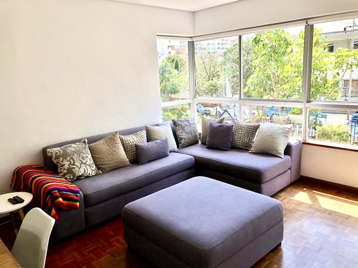 Fully furnished 2-bedroom apartment in Sea Point, balcony, garage, fiber ready. To Rent.