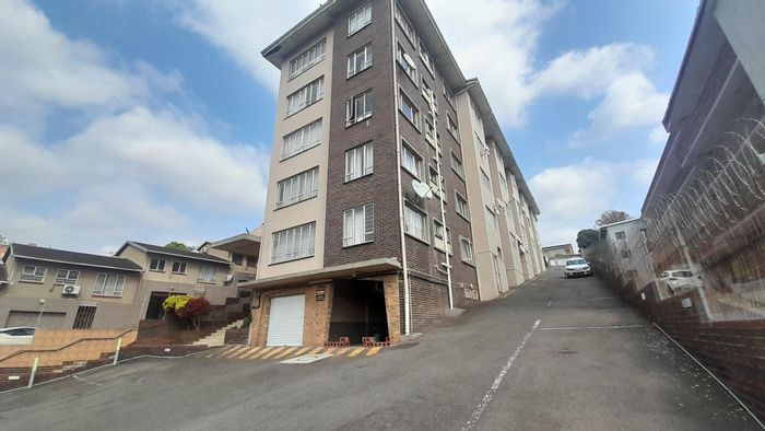 For Sale: 1.5-bedroom apartment in Overport with parking and easy transport access.