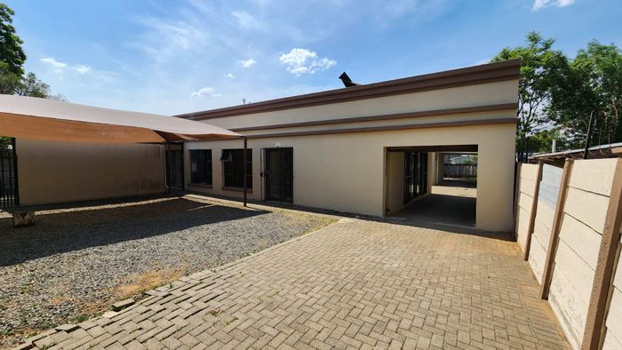 For Sale: 12-bedroom house in Brandwag with flatlet, parking, and NSFAS accreditation.