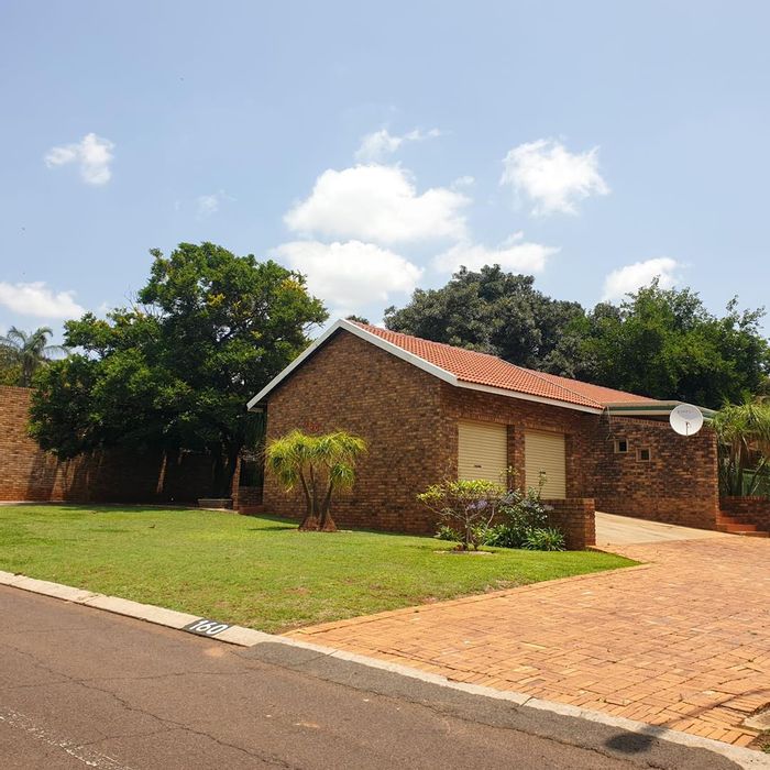 For Sale: Spacious 4-Bedroom House in Ninapark with Large Yard and Double Garage.