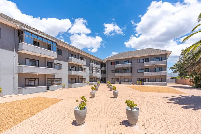Spacious 3-bedroom apartment in Milnerton Central, secure parking, close to amenities. For Sale.