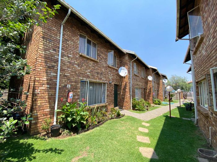 For Sale: Townhouse in Verwoerdpark, 7 fully tenanted duplex units, great rental yield.