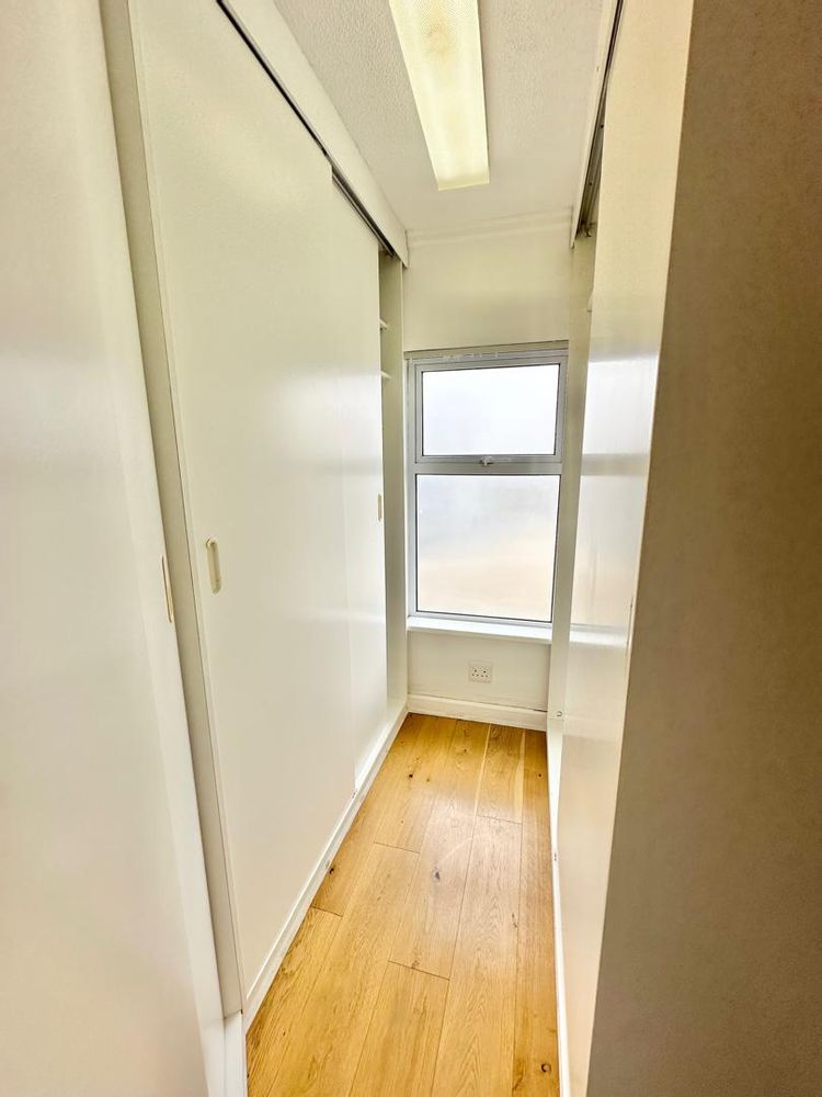 Walk in closet of main bedroom
