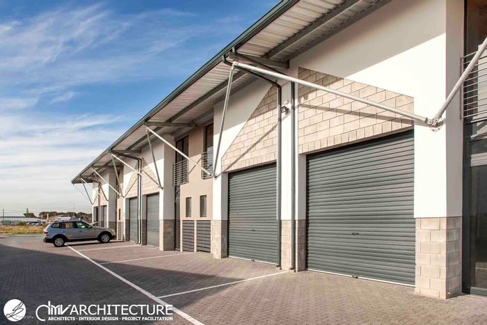 Mixed Use Property For Sale in Fairview: Warehouse, office, kitchenette, and parking included.