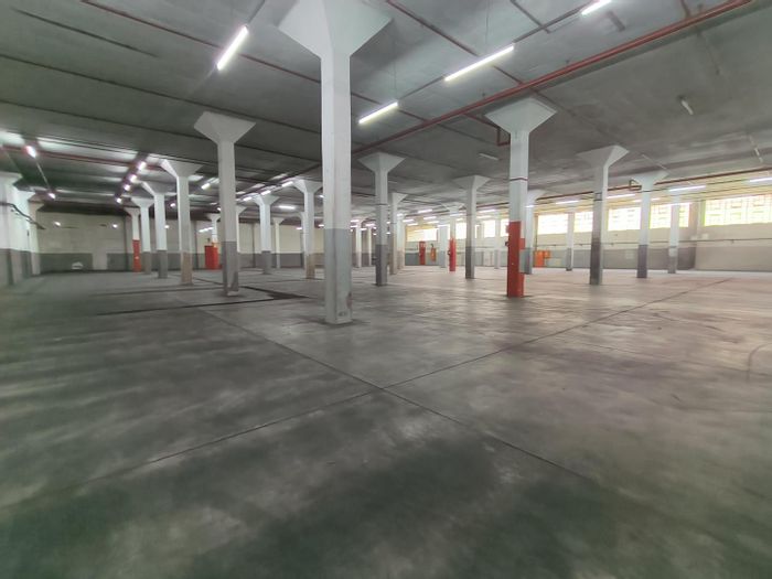 Industrial unit for rent in New Germany with offices, high roof, and security.