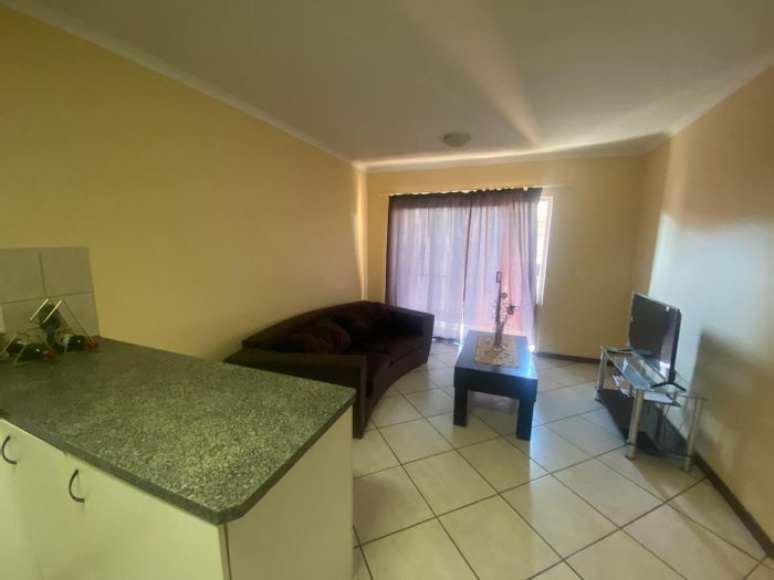 To Rent: Apartment in Noordheuwel with 24-hour security and playground access.