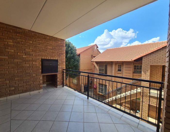 2-Bedroom Apartment To Rent in Hazeldean with Garage, Pool, and Security Features.