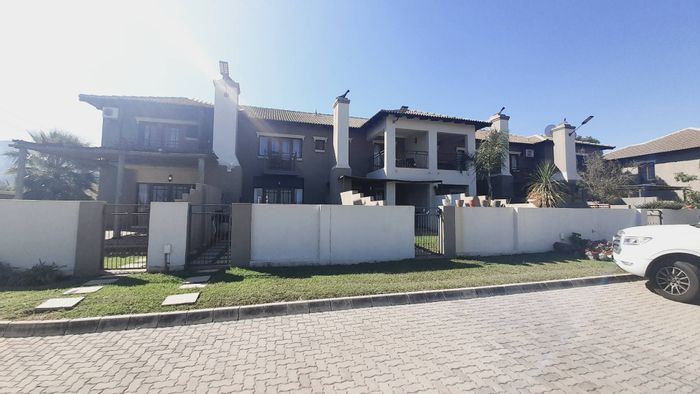 For Sale: Townhouse in Melodie with patio, garden, pool, and clubhouse access.
