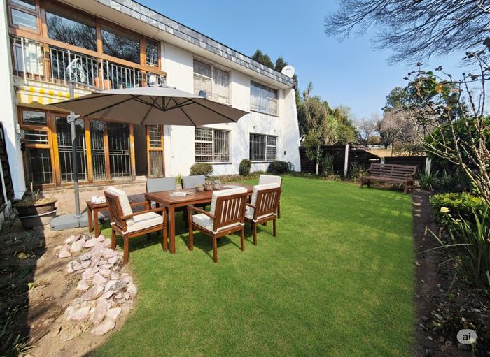 For Sale: Townhouse in Corlett Gardens with private garden, clubhouse, and pool access.