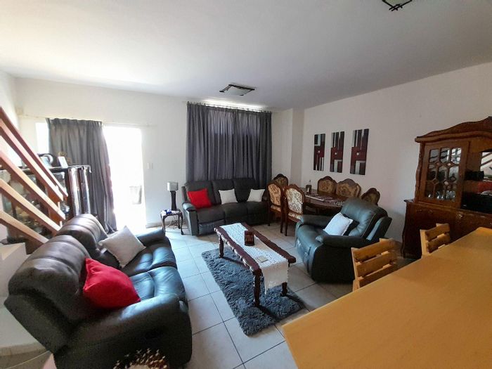 For Sale: Apartment in Mile 4 with 3 beds, garage, and outdoor braai.