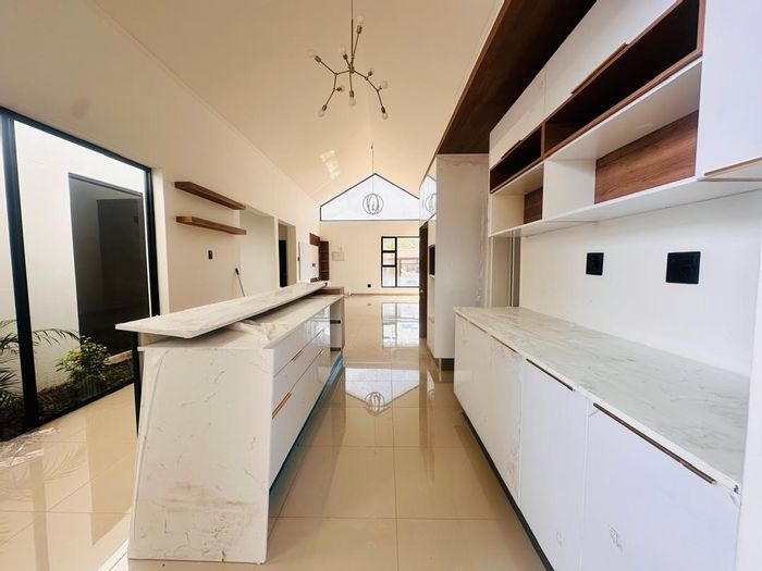 House for Sale in Academia: 4 bedrooms, dual living spaces, rental potential.