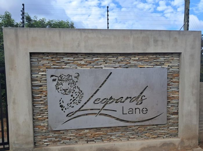 Eco-friendly 2-bedroom house in Hoedspruit Central, off-grid living, for sale.