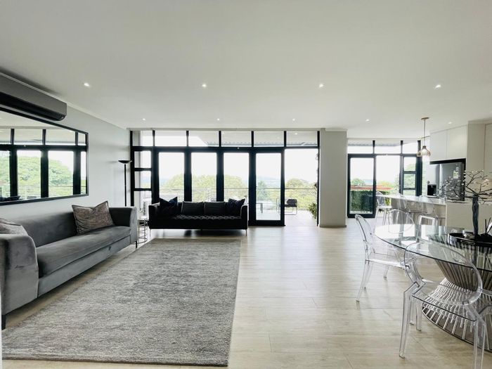 3-Bedroom Penthouse To Rent in Rosebank with balconies and 24/7 security.