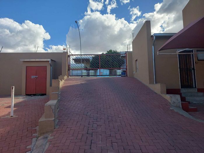 For Sale: 2-Bedroom Apartment in Khomasdal with Private Courtyard and Parking.