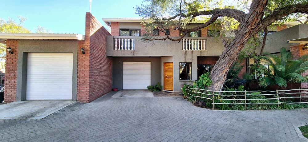 3 Garages, one being a tandem garage