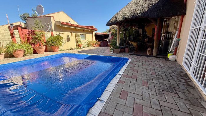 Hochlandpark Townhouse For Sale: 4 beds, pool, garage, and outdoor BBQ area.
