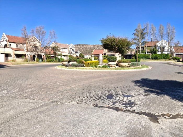 Townhouse To Rent in Meerhof: 3 bedrooms, double garage, private garden, covered patio.