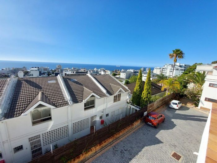 Furnished bachelor apartment in Sea Point, ideal for business travelers, garage parking available.