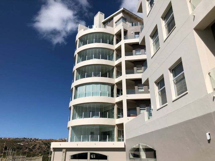 Penthouse For Sale at Diaz Beach: Sea Views, Elevator, Pool, and Direct Beach Access.