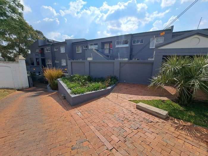 For Sale: Spacious 2-Bedroom Apartment in Oakdene with Covered Parking and Open Plan Living.