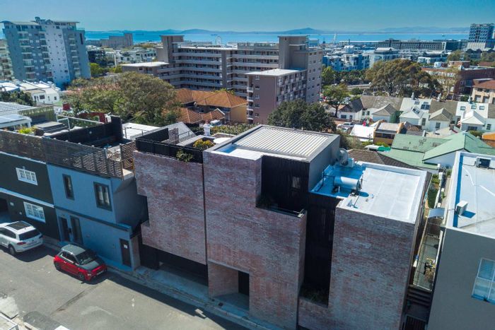 For Sale: Unique Green Point House with rooftop pool, garage, and city views.