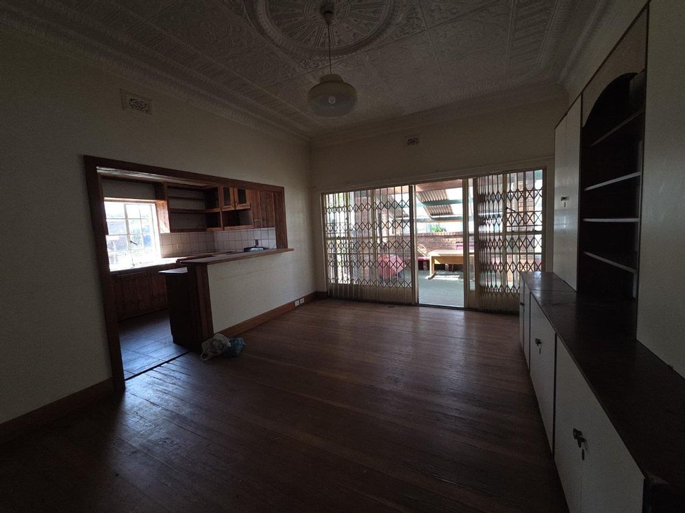 Spacious dining area leading to the kitchen 
