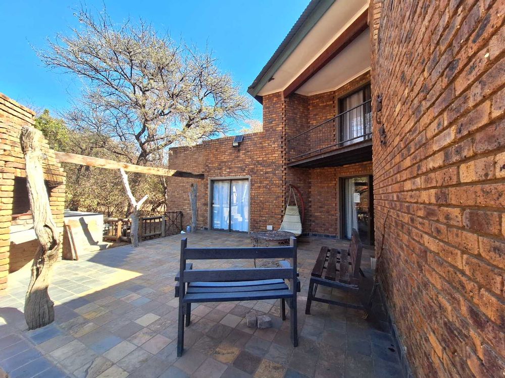 Patio, entertainment area with pool and braai
