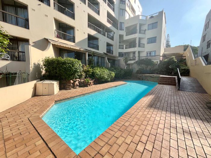 For Sale: Apartment in Umhlanga Central with pool, beach access, and rental potential.
