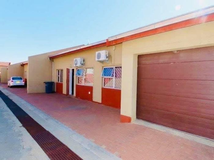 For Sale: Khomasdal Townhouse with 3 Bedrooms, Courtyard, and Tandem Garage.