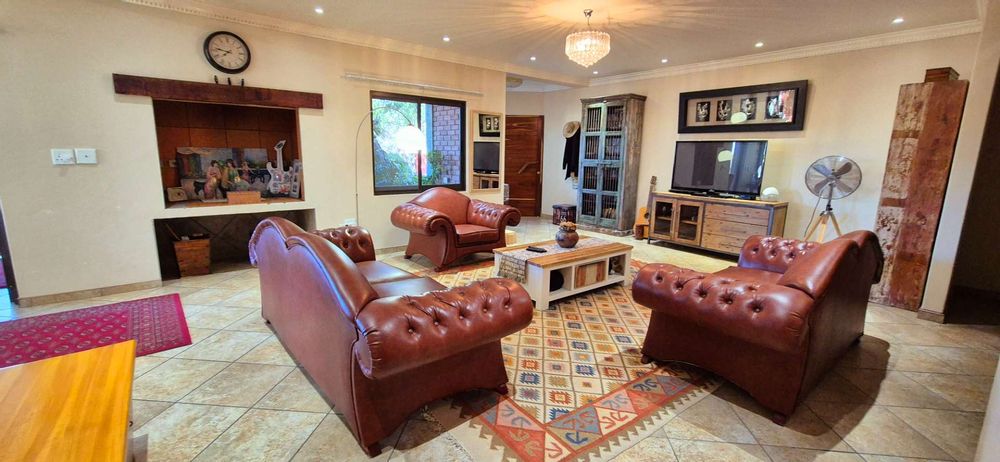 Lounge and TV room  with a built-in braai