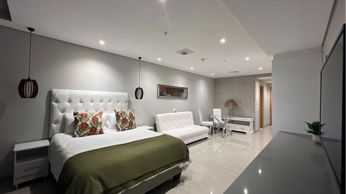 Beachfront apartment in Umhlanga Rocks Central with sea views and exclusive amenities. To Rent.