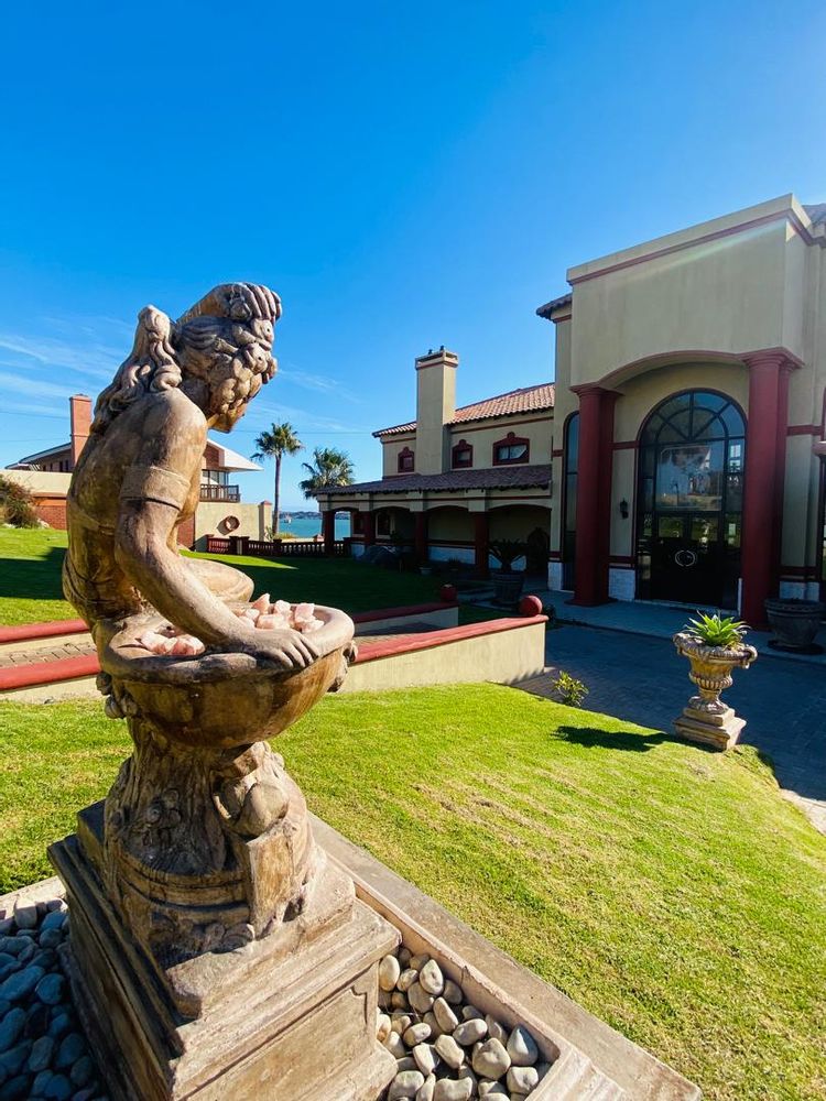 Front entrance and garden statue