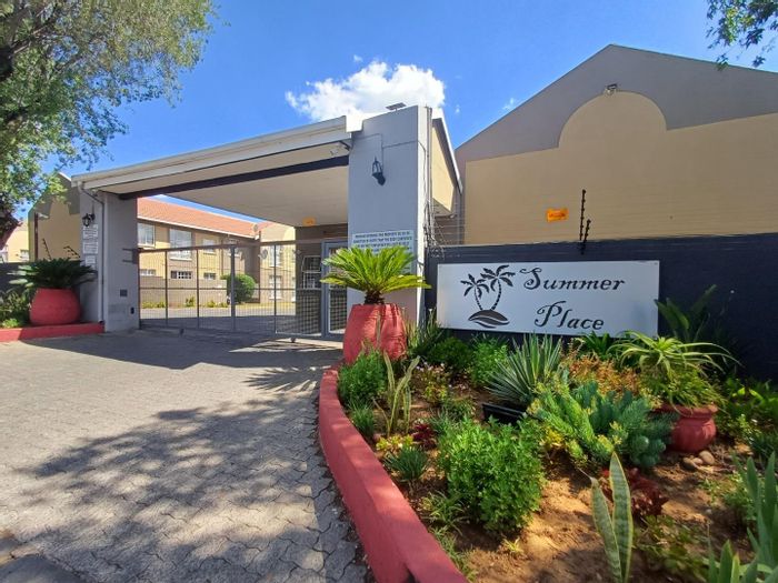 For Sale: Townhouse in Verwoerdpark with pool, security, and three bedrooms.