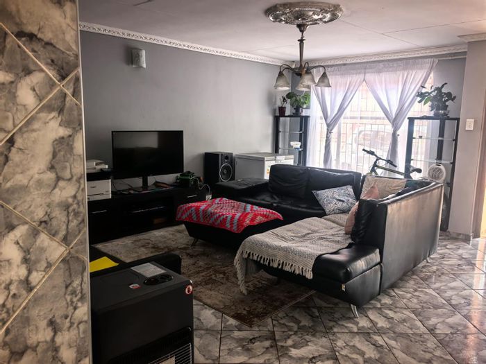 3 Bedroom House for Sale in Soshanguve Central with spacious yard and garage.