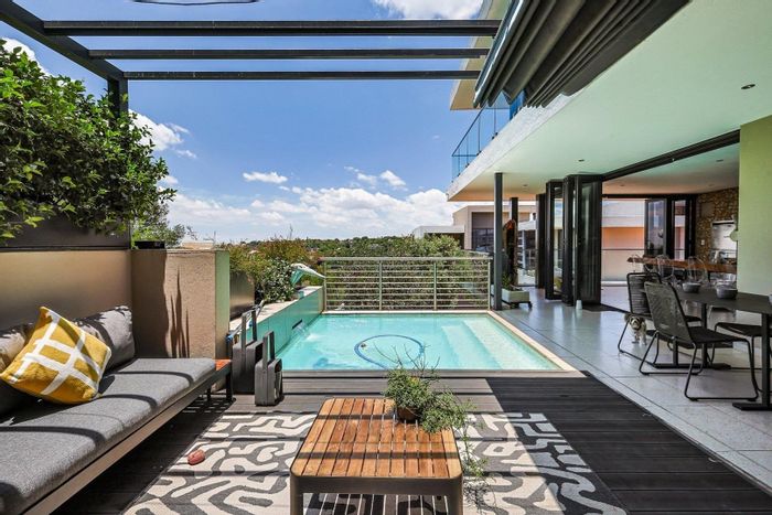 For Sale: House in Waterkloof Ridge with pool, study, and gourmet kitchen.