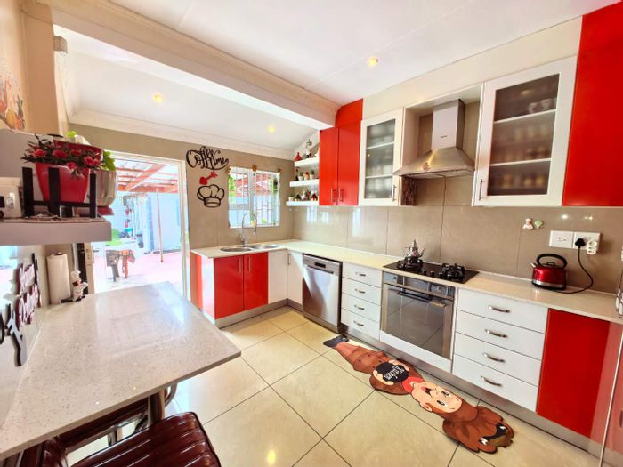 For Sale: Ruyterwacht House with lounge, modern kitchen, patio, carport, and flatlets.