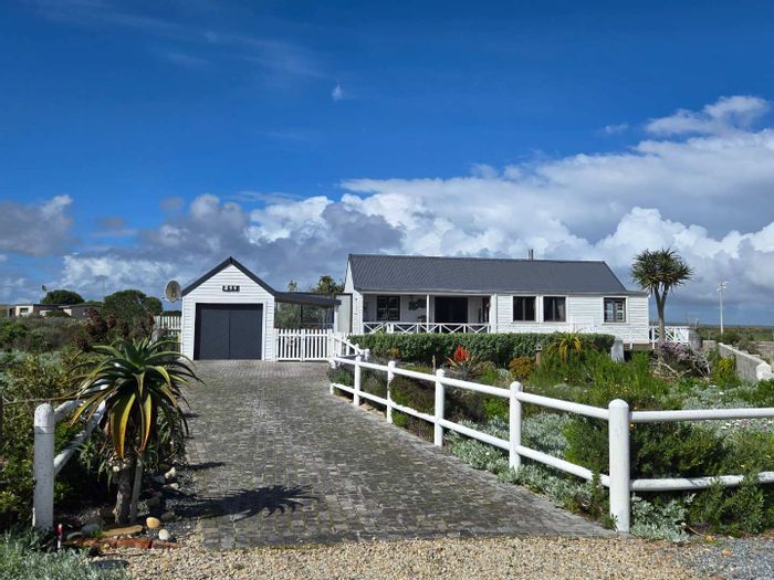 Grotto Bay Central House For Sale: 2 beds, wrap-around patio, nature reserve access.