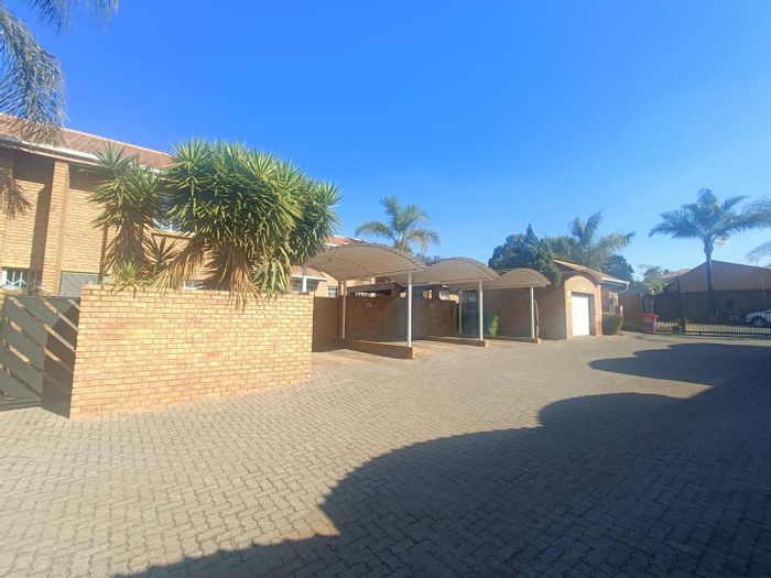 For Sale: 2-Bedroom Townhouse in Zwartkop Ext 7 with private garden and secure parking.